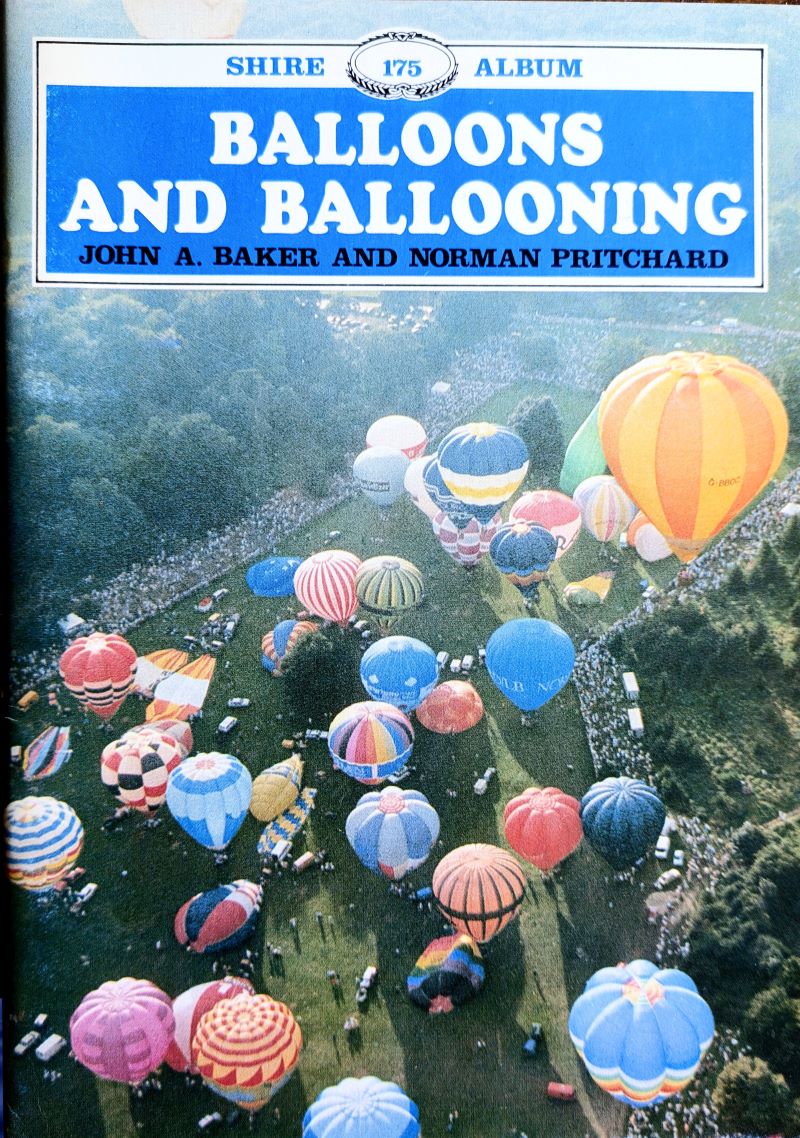 Picture of book cover showing aerial view of numerous colourful hot air balloons launching from a field with large crowd watching from the perimeter.